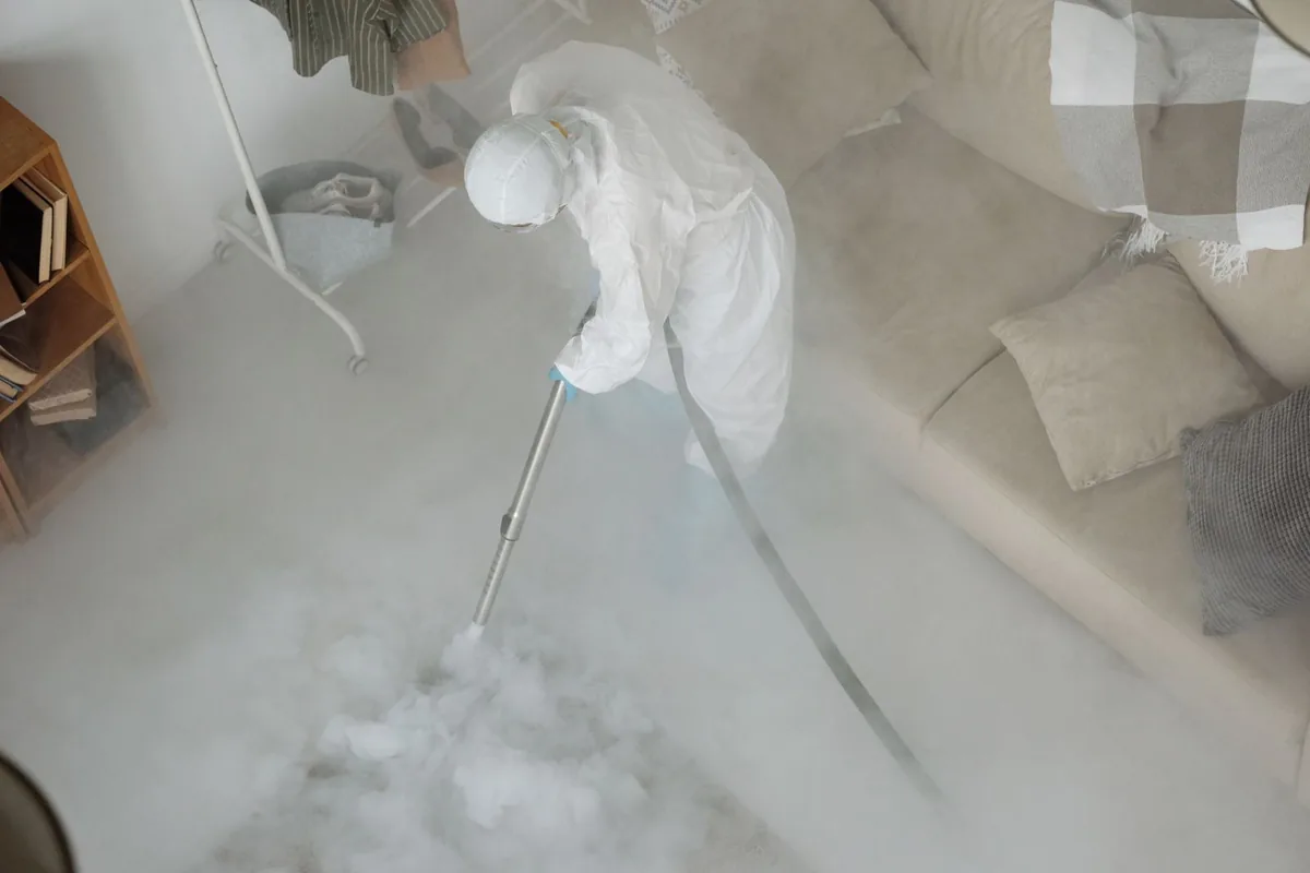 Biohazard cleanup technician in protective equipment, Castle Rock, CO